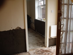 Second step of wall restoration after installing a damp proof course
