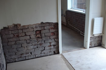 Early stages of repairs to damp-damaged property